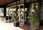 Steellook aluminium kozijnen, vouwwand en zonwering voor lunchroom Eigenwijs in Venlo