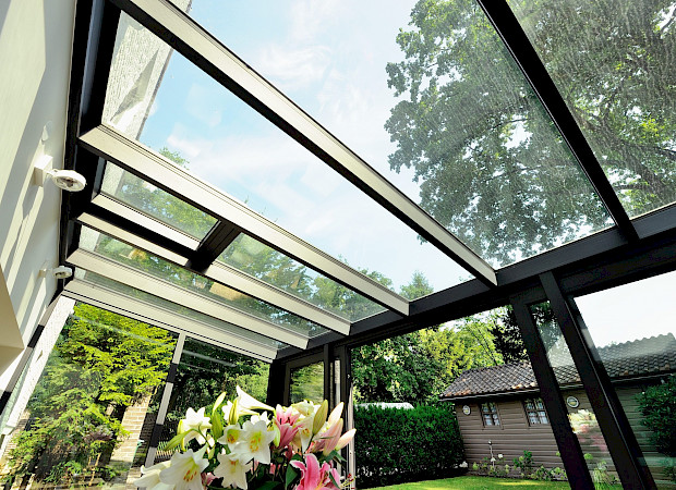 Glazen schuifwand serre