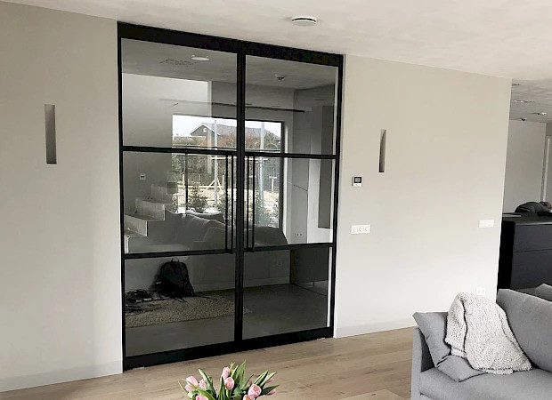 glazen tussendeur woonkamer