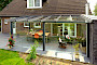 Geniet van je tuin deze zomer met een overkapping of serre