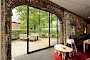Combinatie oud met zwart aluminium kozijn