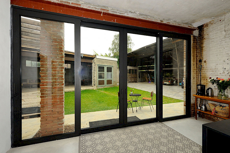 Schuifpui op maat met glas